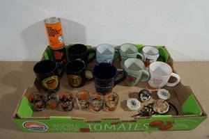 lot 191 image: Vintage Anoka Halloween Coffee Mugs and Beer Cans