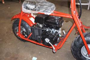 lot 10 image: Coleman CT100U 98cc Gas Powered Mini Bike