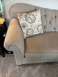 Gray Couch and Throw Pillow