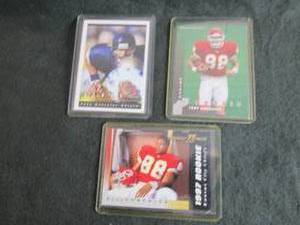 8. 3 Tony Gonzalez Rookie Cards...