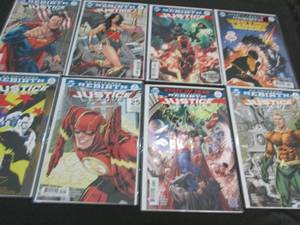 239. 8 Justice League Comic Books...