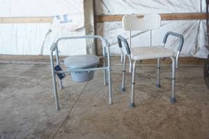 lot 66 image: Shower chair and New folding commode