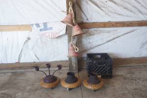 lot 74 image: Rustic bell decor and Candle holder set