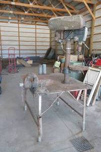 lot 76 image: Heavy duty workbench, vice and drill press