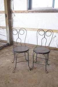 lot 94 image: Twisted Iron Chairs