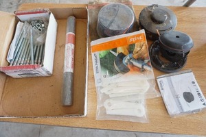 lot 162 image: Sprinkler parts, Concrete bolts, & gasket roll