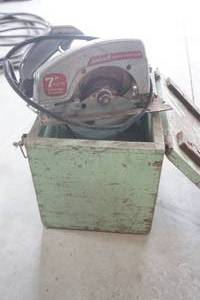 lot 239 image: Vintage wood crate-Sunbeam circular saw