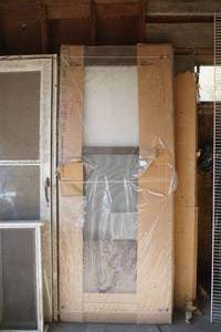 lot 414 image: New Brown Storm door