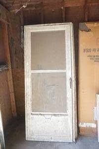 lot 418 image: Used Storm door