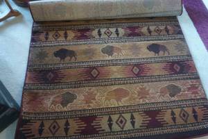 lot 540 image: Buffalo Area Rug