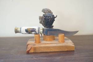 lot 703 image: Bison Knife with Stand