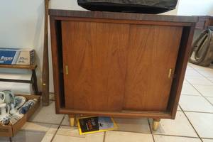 lot 738 image: Wood Sliding Door 2 Shelf Cabinet