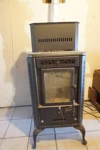 lot 743 image: St Croix Stoves Corn wood stove