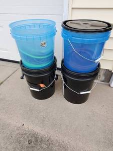 Four Buckets Of Extension Cords