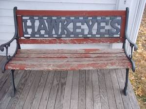 lot 101 image: Wood slatted Park bench with cast i...