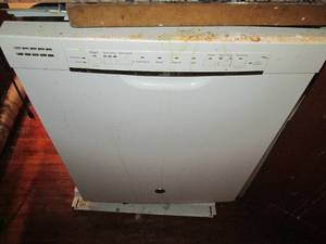 lot 129 image: GE dishwasher, appears complete...