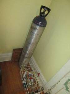 lot 133 image: Oxygen or Acetylene tank with hose ...