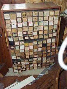 lot 385 image: Bookshelf filled with player piano ...
