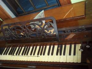 lot 388 image: Antique pump organ that pumps up...