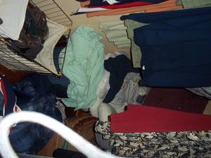 lot 394 image: Contents of closet including clothi...