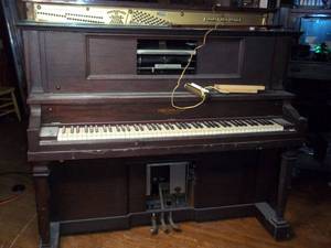 lot 516 image: The cable company player piano...