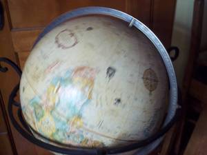 lot 301 image: Globe on decorative metal stand...