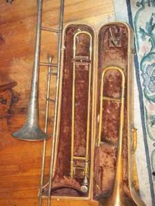 lot 303 image: Vintage slide trombone with case...