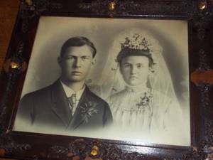 lot 323 image: Antique framed wedding picture...
