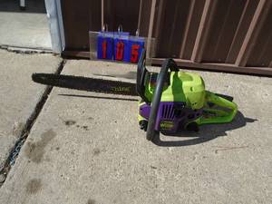 lot 105 image: 18 Poulan wild thing chain saw. Used condition. Nice shape. Tested & works. As shown.