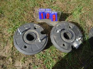 lot 109 image: Tractor wheel weights. Polyconcrete. As shown.