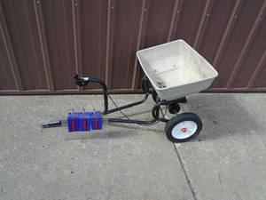 lot 111 image: Pull behind fertilizer spreader. As shown.