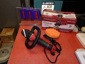 lot 114 image: Toolman 110 volt buffersander. New in box. Was a trade show display. As shown.