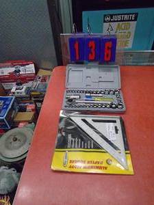 lot 136 image: New socket set & framing square. As shown.