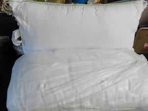 2 King Size Serta Firm Pillows...
