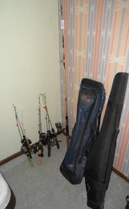 Lot of Fishing Rods and Cases
