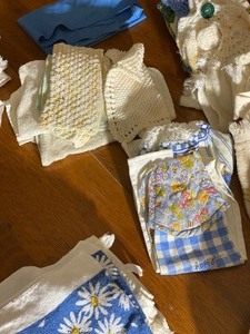 Hand Crocheted potholders, hanging crocheted dish towels, doilies, dish clothes & Magazines