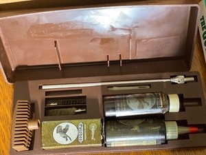 Binoculars 50x50, Leather Case with compass, Gun Parts Manual, Leather Knife sheath, Cleaning Kit