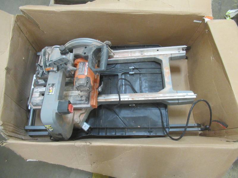 lot 569 image: RIDGID 12 Amp Corded 8 in. Tile Saw with Extended Rip, R4041S - USED, Missing Water Basin, Water Pump - Motor Does NOT Work, For PartsRestore.
