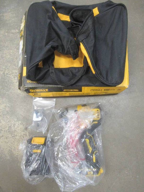 lot 929 image: DEWALT ATOMIC 20-Volt MAX Cordless Brushless Compact 14 in. Impact Driver, (2) 20-Volt 1.3Ah Battery& Bag, DCF809C2 - Missing Charger - LIKE NEW