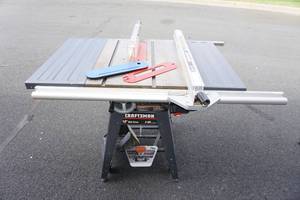 lot 125 image: Craftsman 10 Belt Drive Table Saw with Rolling Stand