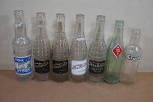 lot 181 image: Vintage Soda Bottles - Barqs, Nesbitts, RC, Crush