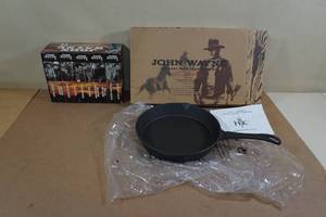 lot 196 image: John Wayne Cast Iron 10 Skillet with VHS Tape Collection