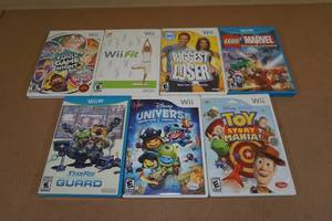 lot 206 image: Wii and Wii U Games -Disney Universe, Wii Fit, LEGO, Toy Story
