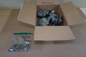 lot 219 image: 4 Heavy Duty Casters with Nuts and Bolts