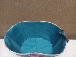 lot 64 image: THE PIONEER WOMEN BLOSSOM FLORAL LAUNDRY BASKET