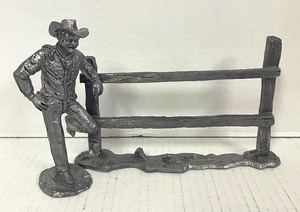 lot 66 image: Cowboy with Fence by the The Ricker-Bartlett Collection of Pewter Casting