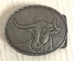 lot 142 image: Western Spur and Horse Bit and a Belt Buckle