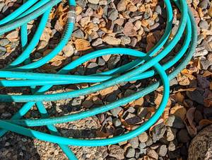 lot 129 image: Three Garden Hoses