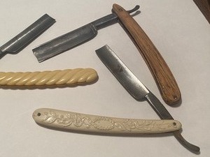 lot 100 image: Three Vintage Straight Razors
