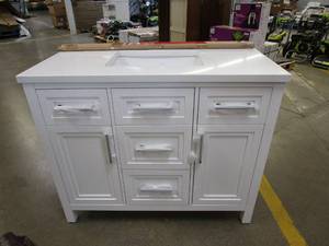 lot 225 image: HOME DECORATORS COLLECTION Mayfield 42 in. W x 22 in. D Vanity in White with Cultured Marble Vanity Top in White with White Basin (SMALL CHIP ON CORNER OF VANITY TOP, SMALL CHUNK MISSING ON BACK PANEL, SEE PHOTOS)